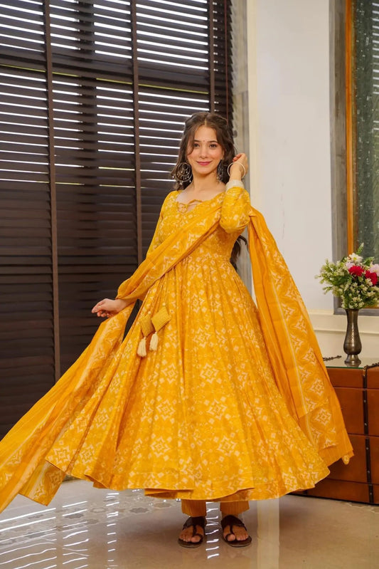 Takshvi Yellow Printed Flared Cotton Anarkali Suit Set With Side Dori Tasselsv, Pant & Dupatta Kurtisthan